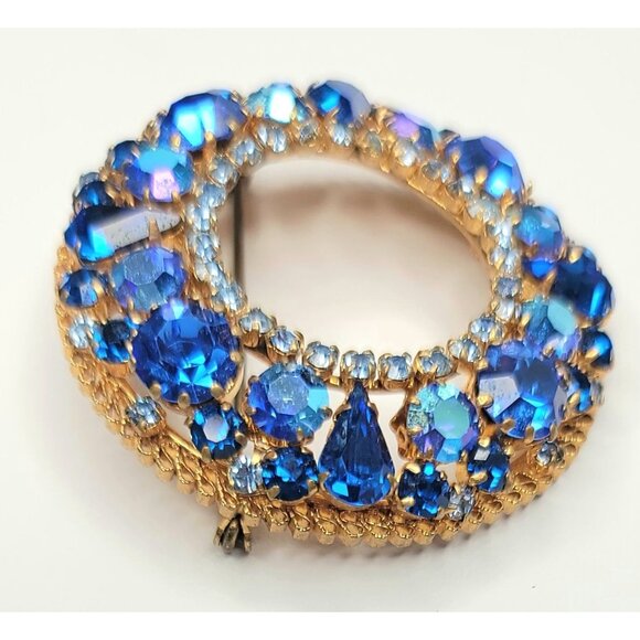 Austria Goldtone Blue Rhinestone Open Round Brooch Signed - Picture 3 of 8